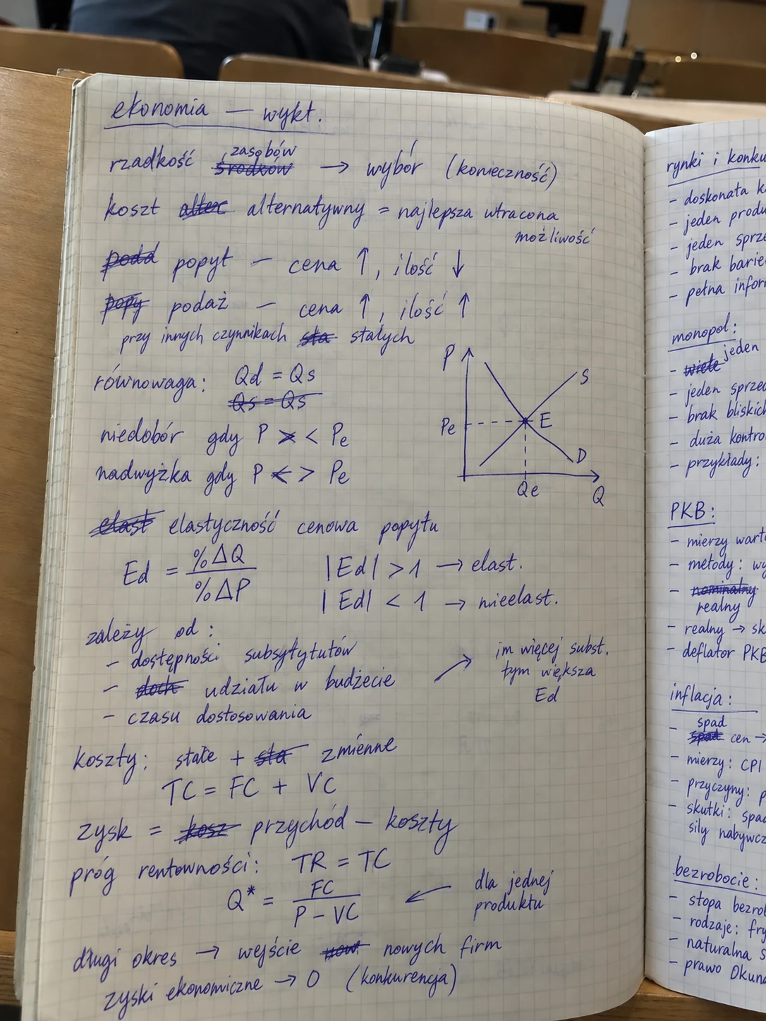 Handwritten lecture notes in a notebook